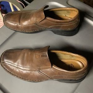 Clark’s brown leather slip ons